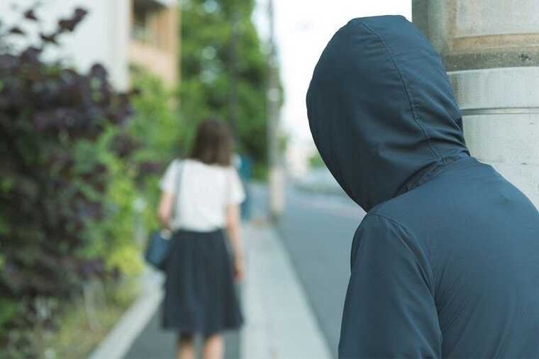 A Muscovite has been charged with stalking, assault, and arson of his ex-wife's property.