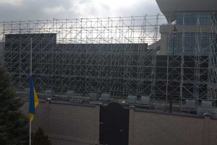A Ukrainian flag was covered by a screen in Bishkek during Putin's visit.
