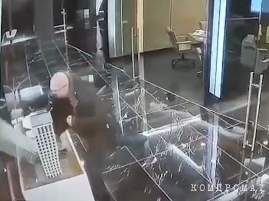 Footage captured by a CCTV camera.  Valery Nemirovsky destroys the office where he came for negotiations