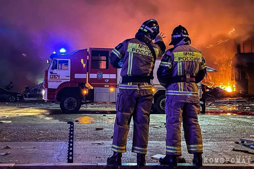 Fire brigades work at the gas station