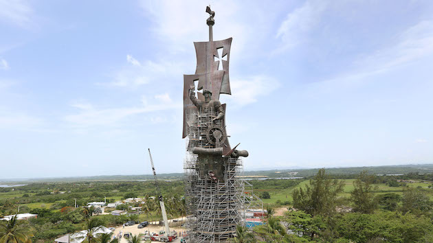 'birth of a new world' sculpture by russian artist zurab tsereteli 'birth of a new world' sculpture by russian artist zurab tsereteli, arecibo, puerto rico - 14 jun 2016 weighing in at over 6,500 tons and towering at 268ft high - double the height of rio de janeiro's christ the redeemer - 'birth of a new world' by leading russian artist zurab tsereteli, an awe-inspiring modern day colossus, was yesterday presented to the world in arecibo, puerto rico. created as a monument to mark the 500th anniversary of christopher columbus' expedition to the americas, the sculpture has been three years in production. facts and figures about birth of a new world: 268ft tall, 6,500 tons, 2,500 pieces of bronze and steel manufactured in russia, 110,000+ man hours to assemble with a process that started in arecibo, puerto rico in december 2013. bronze cast in 3 different foundries, including the oldest continuously operating foundry in the world which dates from the 18th century and the reign of catherine the great. the sculpture has taken more than 25 years from conception to completion (rex features via ap images)