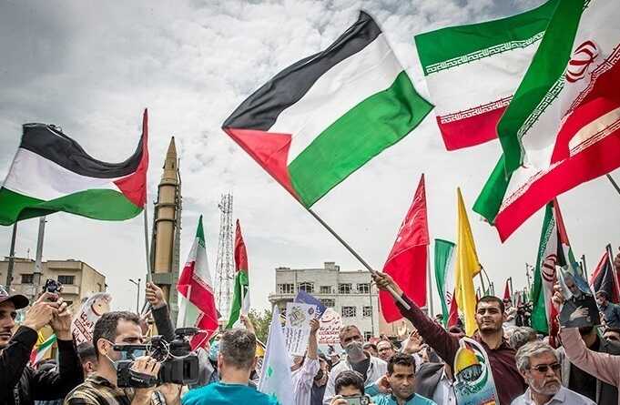 Iranian media reported strikes on Tehran during mass marches on Palestine Day.