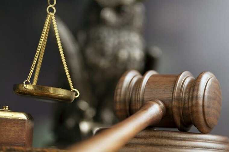 The former head of the migration department in the Slavyansk district is accused of bribery and aiding illegal migrants.